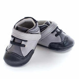 A front view of Jack and Lily's Emerson children's barefoot shoe in grey