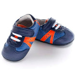 A front view of Jack and Lily's Denny children's barefoot shoe in blue