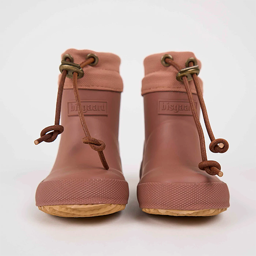 A baby 2025 and a boot