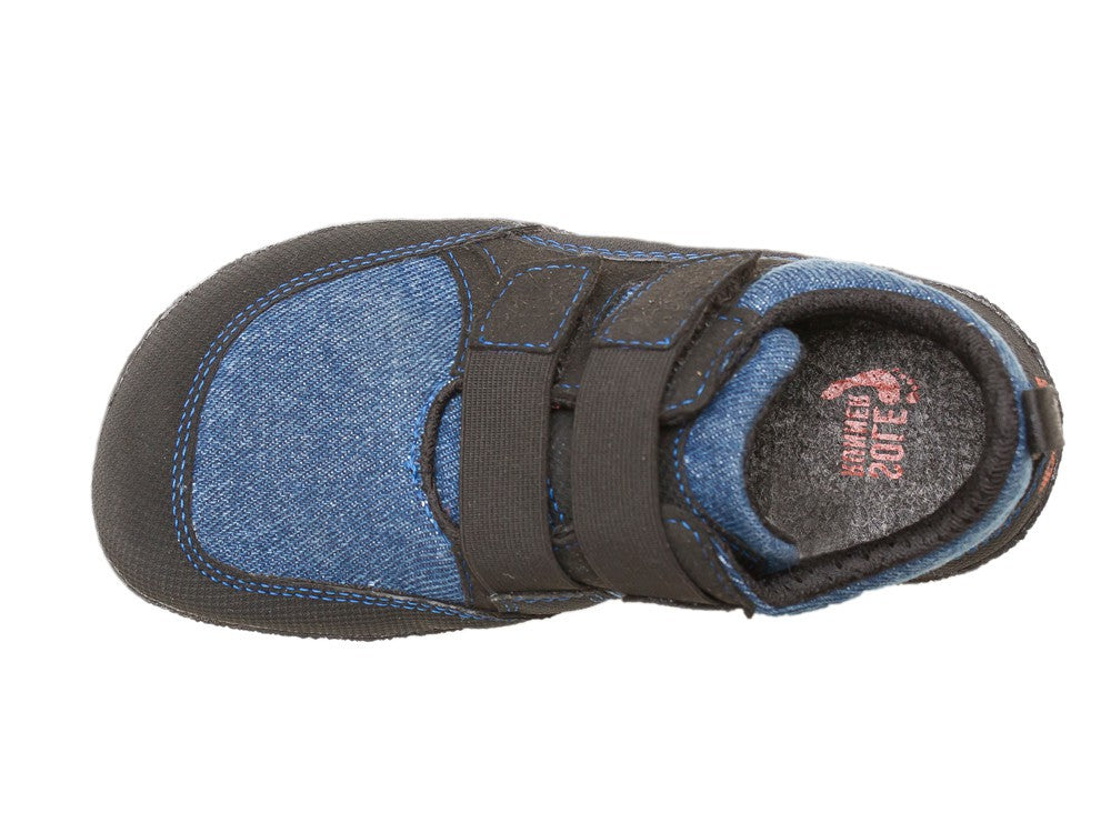 A top-down view of a blue Puck children's barefoot shoe by Sole Runner
