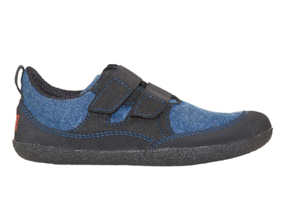 A side view of a blue Puck children's barefoot shoe by Sole Runner